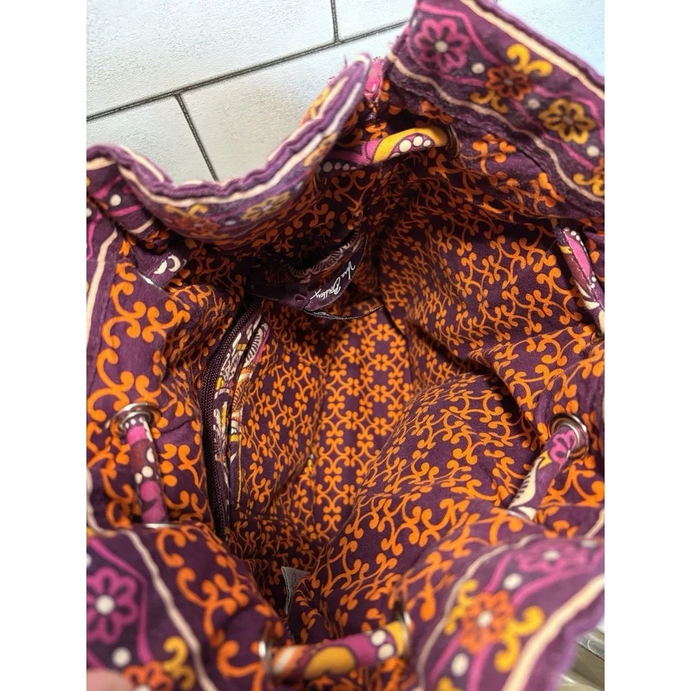 Vera Bradley overall carefully